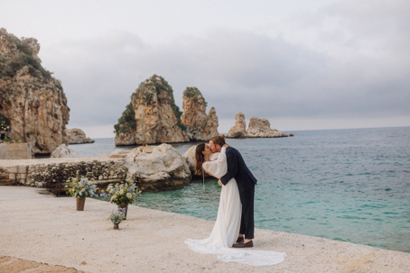 bride and groom kissing on their wedding day