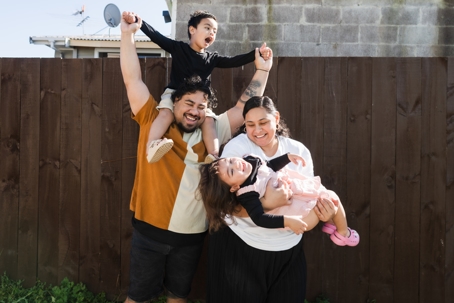 happy family playing outside