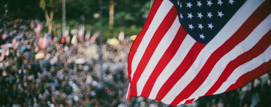 American flag and people